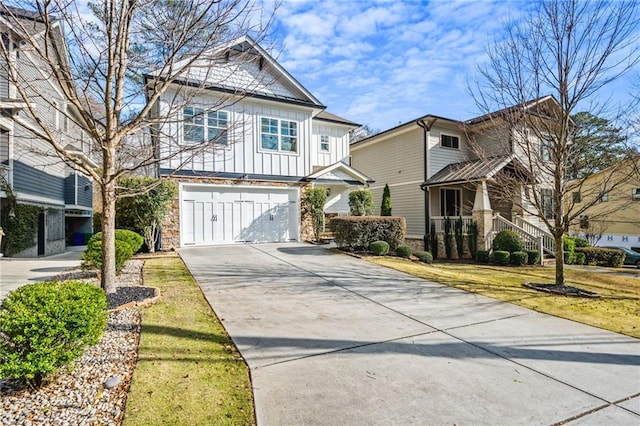 view of front of house featuring a garage and a front lawn