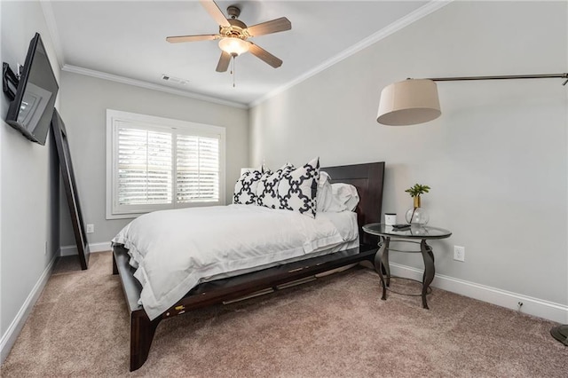 bedroom featuring carpet flooring, ceiling fan, and crown molding