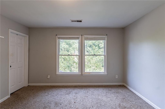 402 John Tate Rd NW, Acworth, GA 30102 - empty room featuring healthy amount of natural light and carpet