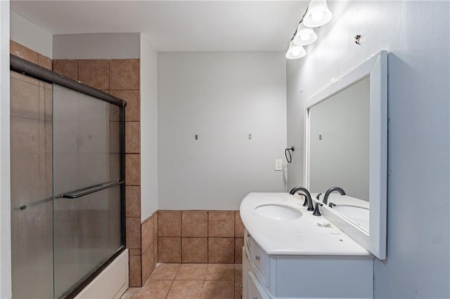 402 John Tate Rd NW, Acworth, GA 30102 - full bathroom with vanity, tile patterned floors, and shower / bath combination with glass door
