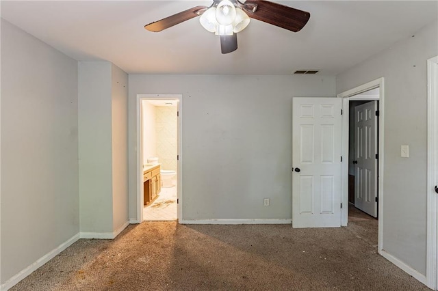 402 John Tate Rd NW, Acworth, GA 30102 - unfurnished bedroom with carpet floors, connected bathroom, and ceiling fan