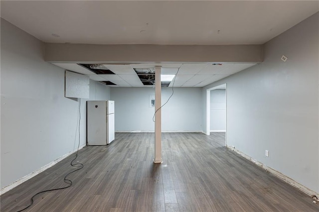402 John Tate Rd NW, Acworth, GA 30102 - finished below grade area featuring freestanding refrigerator, wood finished floors, and a drop ceiling