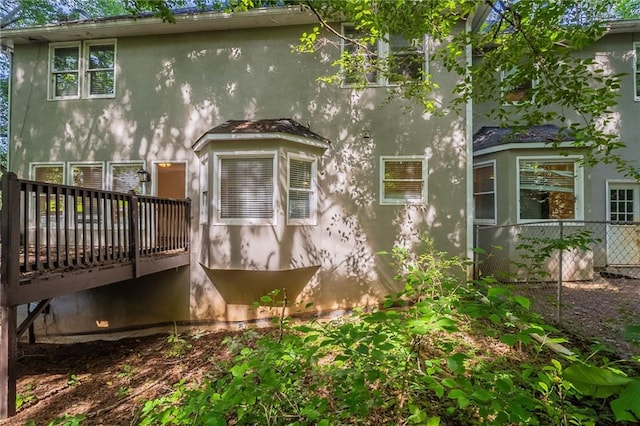 402 John Tate Rd NW, Acworth, GA 30102 - view of property exterior with stucco siding and a wooden deck