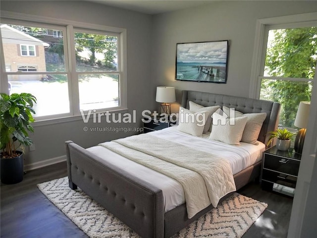 257 E Simon Ter NW, Atlanta, GA 30318 - bedroom featuring baseboards and wood finished floors