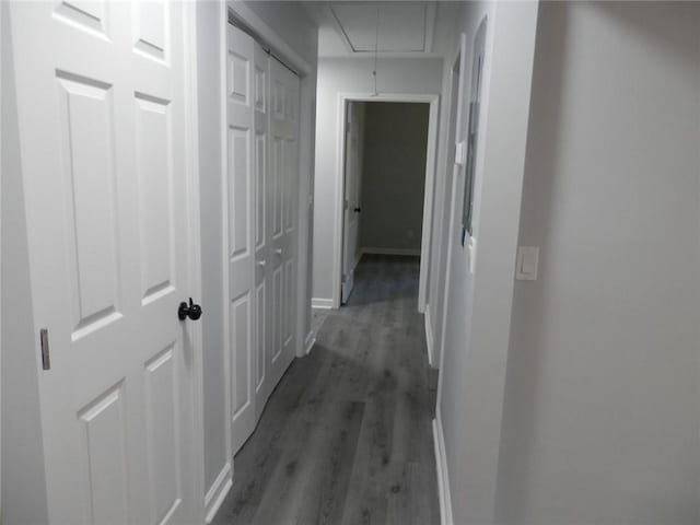 257 E Simon Ter NW, Atlanta, GA 30318 - corridor with baseboards, attic access, and wood finished floors