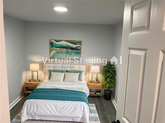 257 E Simon Ter NW, Atlanta, GA 30318 - bedroom featuring baseboards and wood finished floors