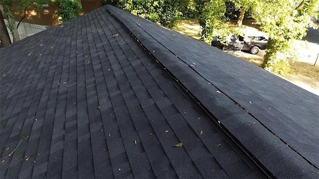 257 E Simon Ter NW, Atlanta, GA 30318 - exterior details featuring roof with shingles