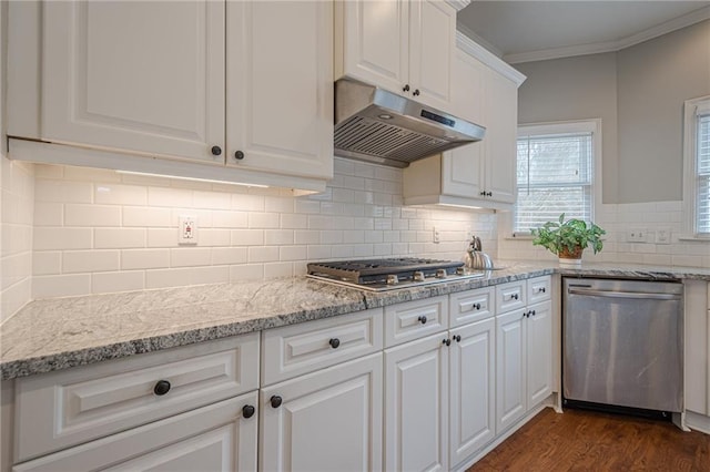 kitchen featuring stainless steel appliances, backsplash, white cabinets, and dark hardwood / wood-style flooring