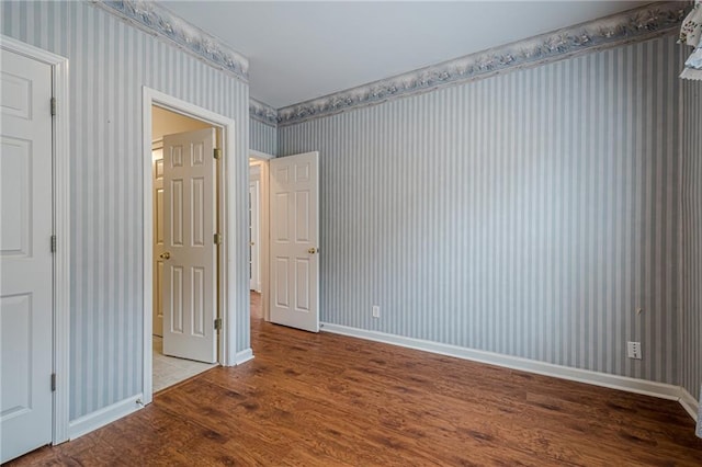 unfurnished bedroom with light wood-type flooring