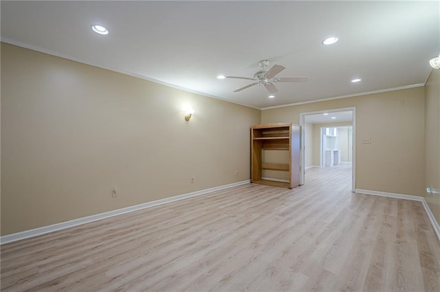 empty room with crown molding, light hardwood / wood-style flooring, and ceiling fan