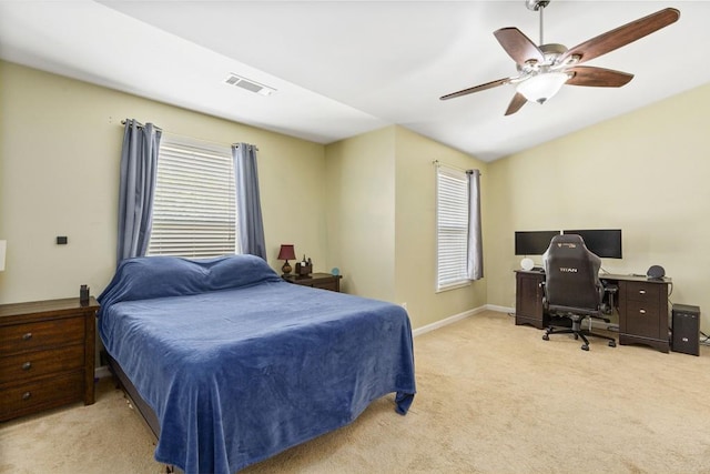 bedroom with carpet floors, a desk, ceiling fan, and baseboards