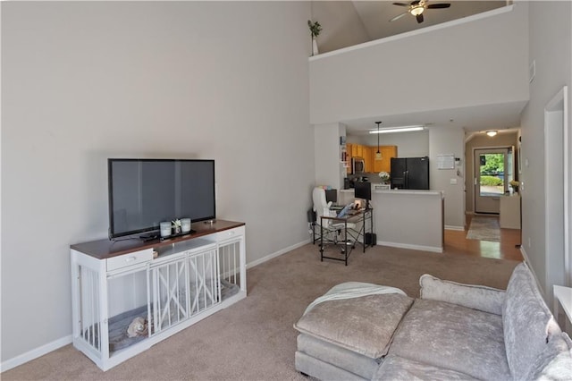 210 Cottonwood Creek Cir, Canton, GA 30114 - carpeted living area featuring high vaulted ceiling, a ceiling fan, and baseboards
