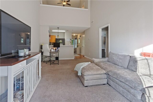 210 Cottonwood Creek Cir, Canton, GA 30114 - living area with light carpet, a towering ceiling, ceiling fan, and an office area