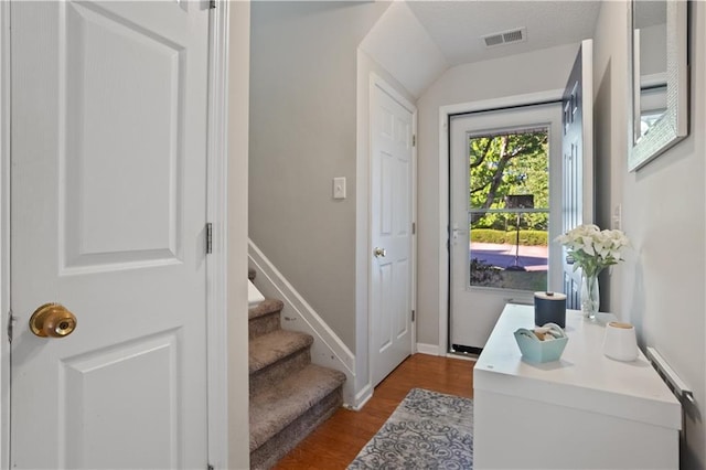 210 Cottonwood Creek Cir, Canton, GA 30114 - entryway with dark wood finished floors, stairs, and baseboards