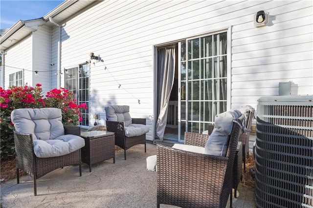 210 Cottonwood Creek Cir, Canton, GA 30114 - view of patio featuring central AC unit and an outdoor living space