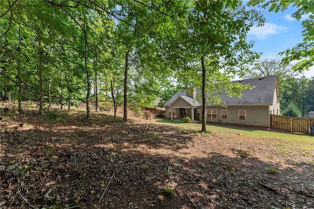 view of yard featuring fence