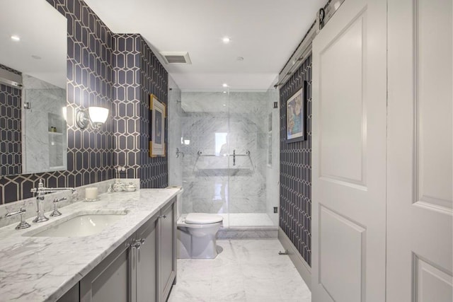 bathroom featuring tile walls, toilet, vanity, and walk in shower