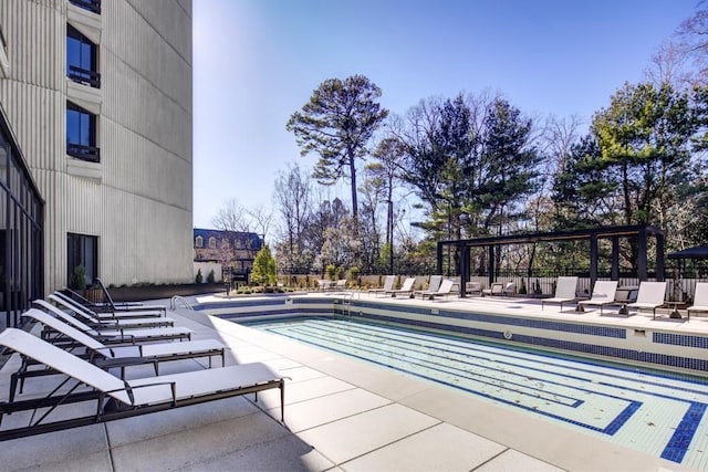 view of swimming pool with a patio