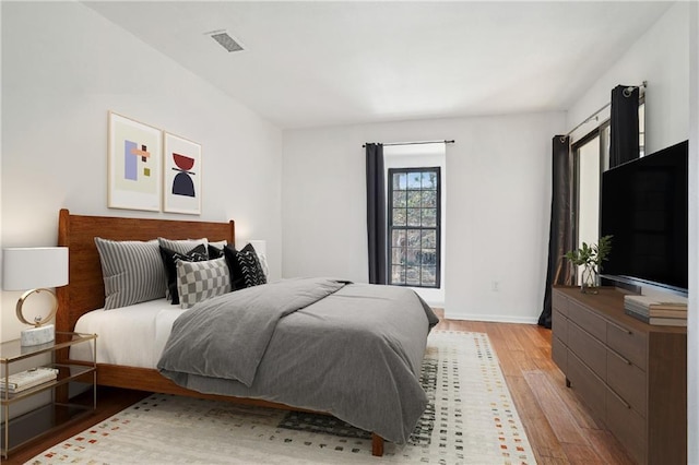 bedroom featuring light hardwood / wood-style flooring