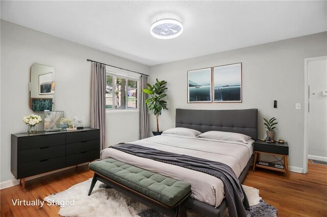 2215 Springdale Rd SW, Atlanta, GA 30315 - bedroom featuring wood finished floors and baseboards