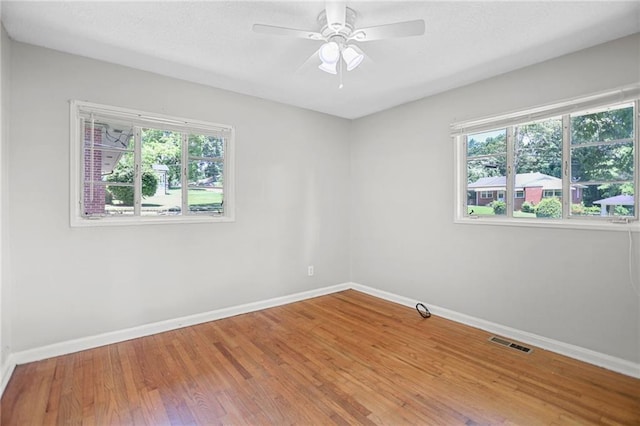 2215 Springdale Rd SW, Atlanta, GA 30315 - empty room with baseboards, wood finished floors, and ceiling fan
