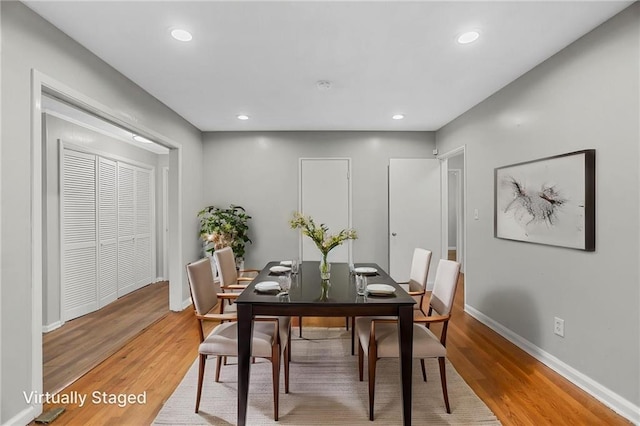 2215 Springdale Rd SW, Atlanta, GA 30315 - dining area with light wood-style flooring, recessed lighting, and baseboards