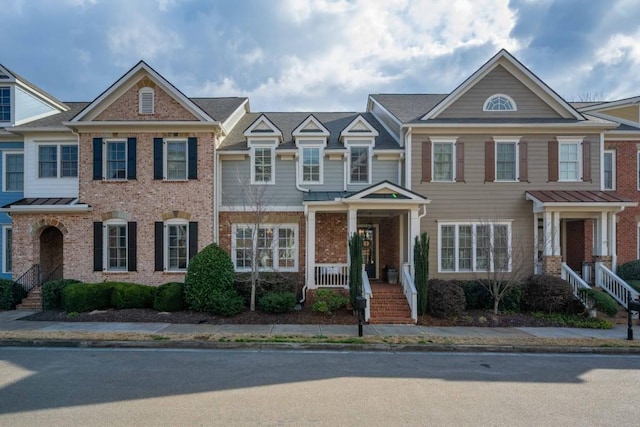 multi unit property featuring brick siding