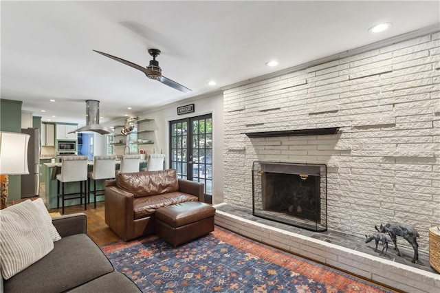 205 Glencourtney Dr, Sandy Springs, GA 30328 - living area featuring ceiling fan, recessed lighting, wood finished floors, and a brick fireplace