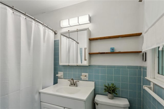 205 Glencourtney Dr, Sandy Springs, GA 30328 - bathroom with vanity, toilet, tile walls, and curtained shower
