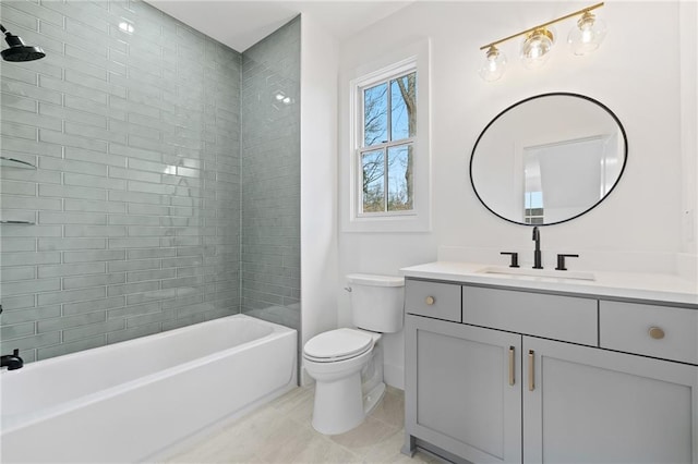 full bathroom with tiled shower / bath combo, vanity, and toilet