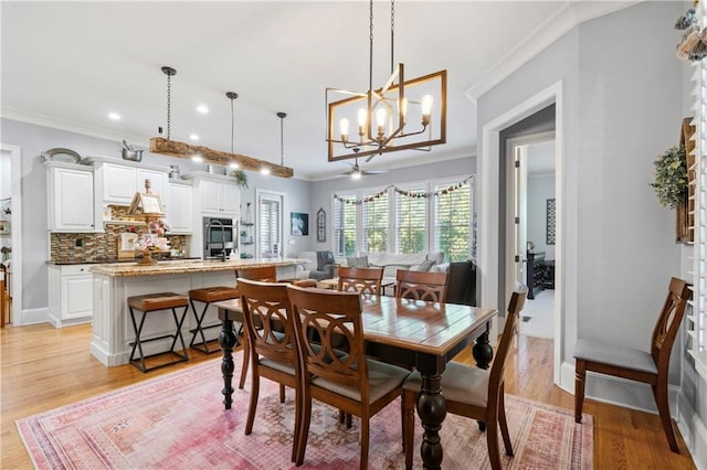 11 York Trce, Cartersville, GA 30121 - dining room with ornamental molding, light wood finished floors, a chandelier, baseboards, and recessed lighting