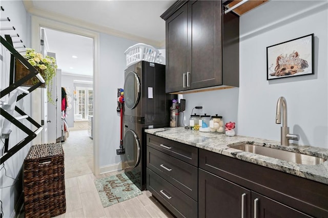 11 York Trce, Cartersville, GA 30121 - kitchen with a sink, light stone countertops, dark brown cabinets, baseboards, and recessed lighting