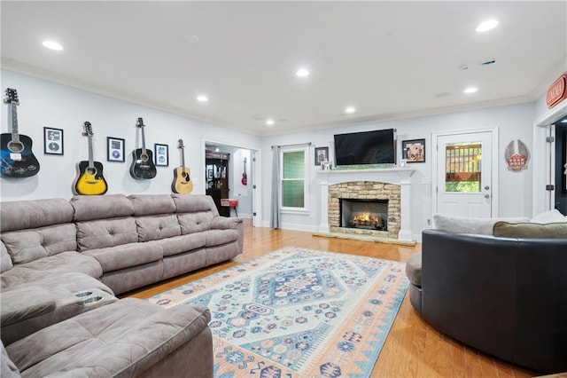11 York Trce, Cartersville, GA 30121 - living room featuring ornamental molding, light wood-type flooring, a fireplace, and recessed lighting