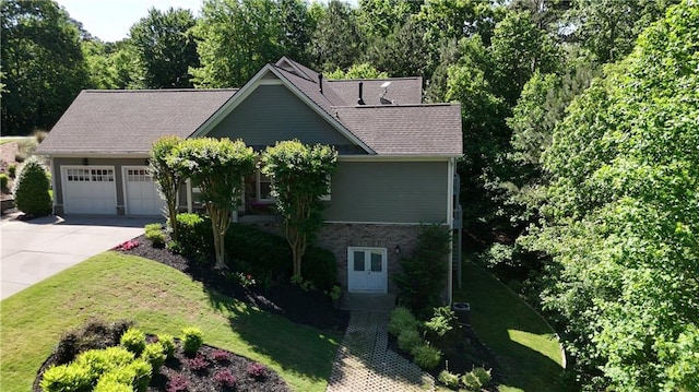 11 York Trce, Cartersville, GA 30121 - view of front of property with a garage, driveway, a front lawn, brick siding, and roof with shingles