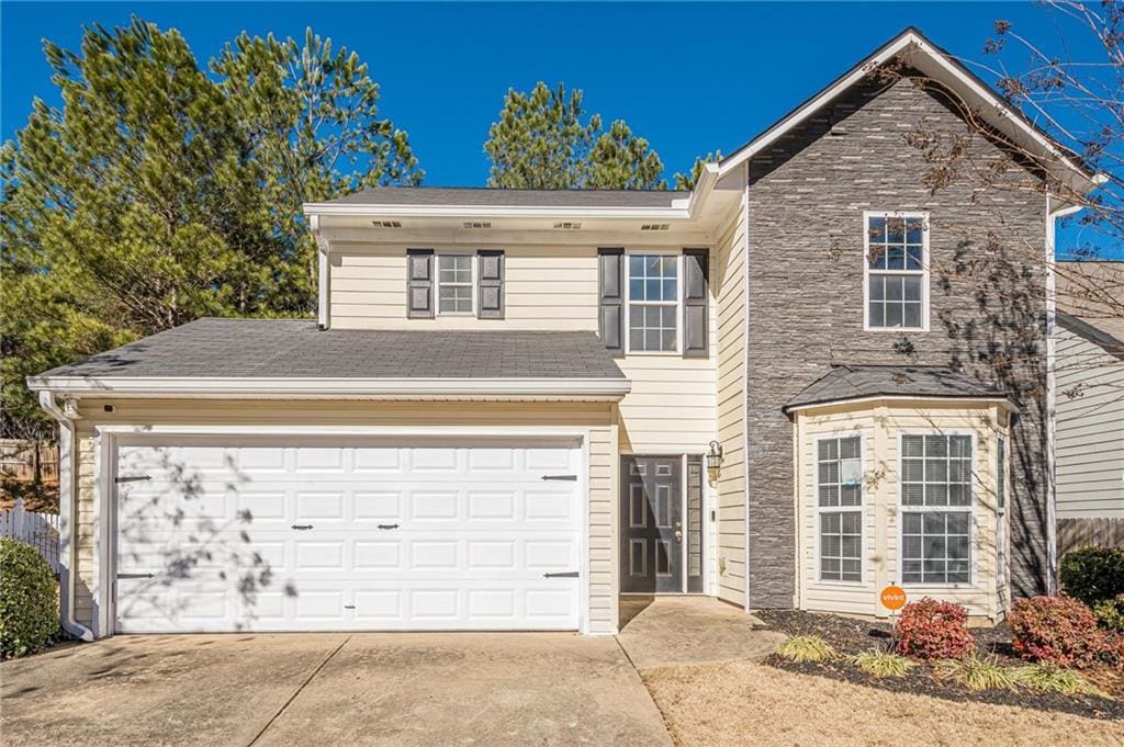 view of property with a garage