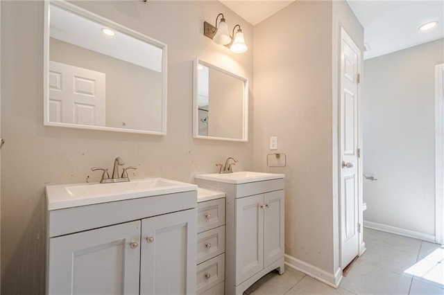 bathroom with vanity and tile patterned floors