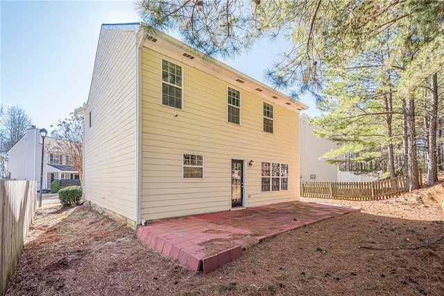 rear view of house featuring a patio area