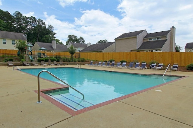 view of swimming pool featuring a patio