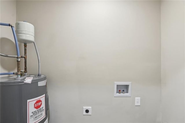 laundry area featuring water heater, hookup for a washing machine, and hookup for an electric dryer