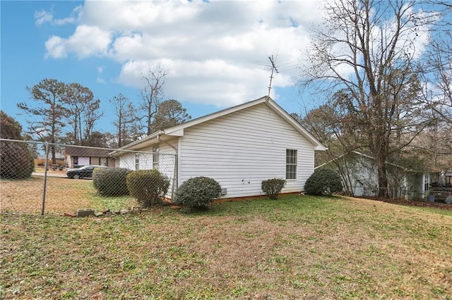 view of property exterior featuring a yard