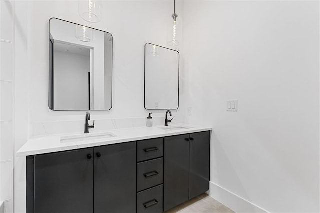 bathroom featuring tile patterned floors and vanity