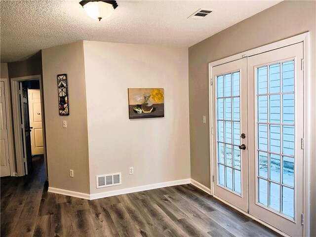 unfurnished room featuring hardwood / wood-style flooring and ceiling fan