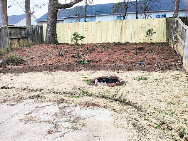 view of home's community with a lawn