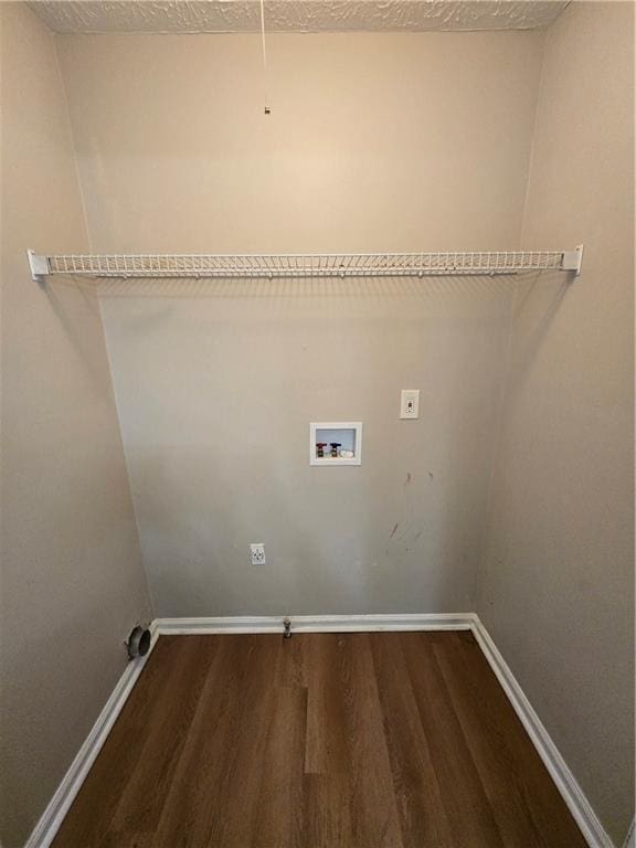 laundry room with electric dryer hookup, washer hookup, and dark hardwood / wood-style floors