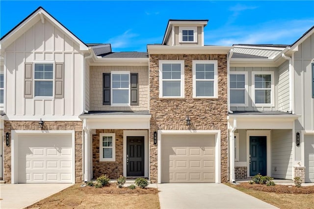 105 Village Green Dr Unit 171, Adairsville, GA 30103 - multi unit property with stone siding, board and batten siding, driveway, and a garage