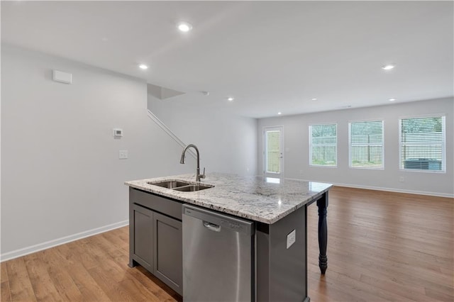105 Village Green Dr Unit 171, Adairsville, GA 30103 - kitchen with light wood finished floors, baseboards, dishwasher, a kitchen island with sink, and a sink