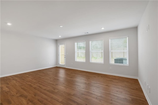 105 Village Green Dr Unit 171, Adairsville, GA 30103 - spare room with dark wood finished floors, baseboards, visible vents, and recessed lighting