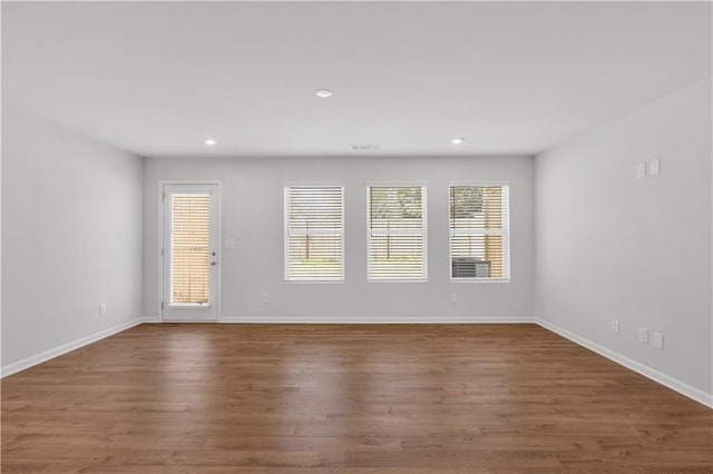 105 Village Green Dr Unit 171, Adairsville, GA 30103 - empty room featuring baseboards, visible vents, wood finished floors, and recessed lighting