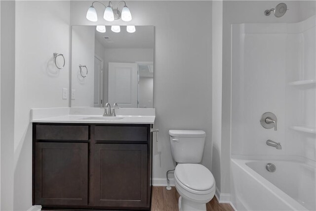 105 Village Green Dr Unit 171, Adairsville, GA 30103 - full bathroom featuring vanity, shower / bath combination, toilet, baseboards, and wood finished floors
