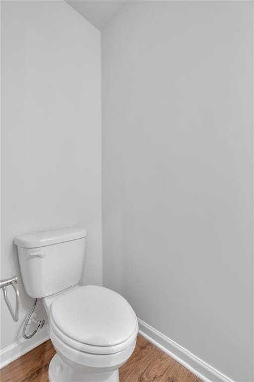 105 Village Green Dr Unit 171, Adairsville, GA 30103 - bathroom featuring baseboards, wood finished floors, and toilet